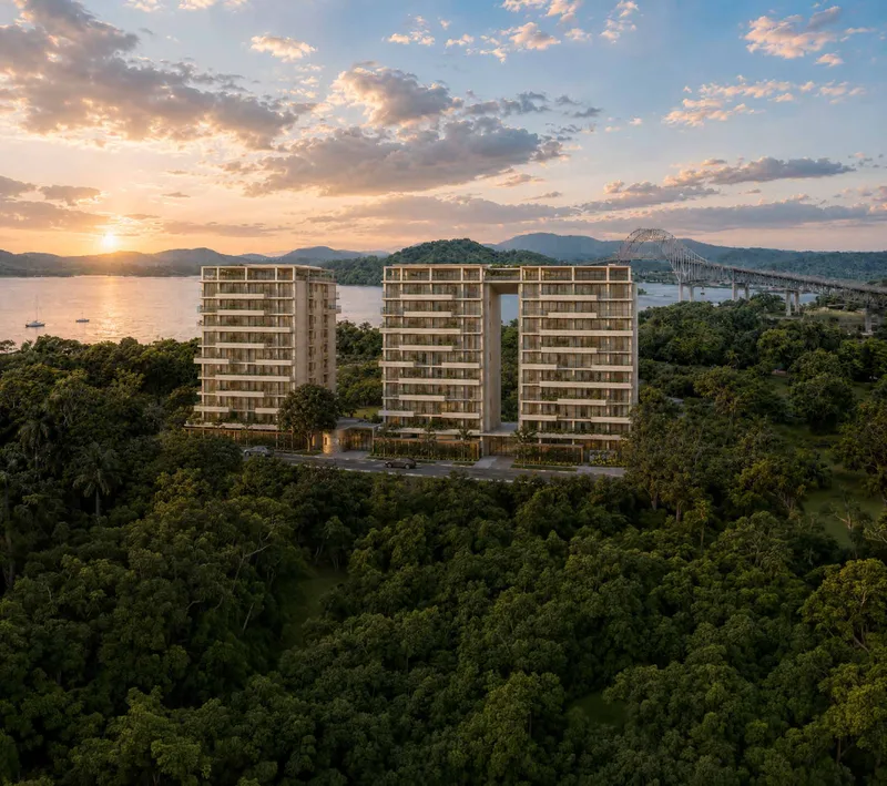 Render aereo de las tres torres de TR33 at Amador al atardecer, frente al Canal de Panama y el Puente de las Americas