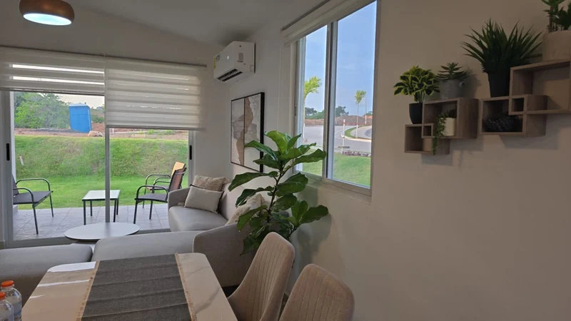 Living-dining room opening onto the terrace