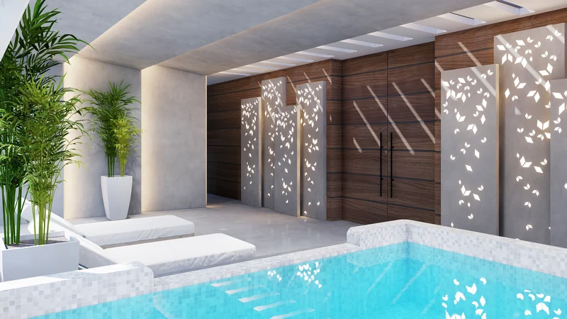 Spa con piscina cubierta y camastros